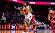 Jordan Mason, 32, of the Temple Owls drives the ball during an NCAA men's basketball game...