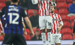 Bosun Lawal of Stoke City heads the ball during the Sky Bet Championship match between Sto...