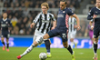 Kiliann Sildillia of PSV Eindhoven and Anthony Gordon of Newcastle United participate in t...