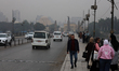 Fog covers the sky of Cairo on the Nile Corniche in the capital, downtown Egypt, on Januar...