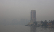 Fog covers the sky of Cairo on the Nile Corniche in the capital, downtown Egypt, on Januar...