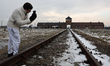 A view of the Main Gate at the former Nazi German concentration camp Auschwitz II-Brikenau...