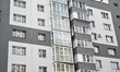 Restored nine-storey residential buildings stand on Zaporizka Street in Zaporizhzhia, Ukra...