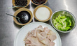 In Chengdu, China, on April 12, 2025, Chef Xu Xiaohong prepares an iconic Sichuan dish, hu...