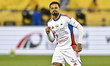 Caio Lucas of Sharjah reacts after scoring in the penalty shootout during the Super Cup Qa...