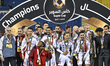 The players of Sharjah celebrate after winning the Super Cup Qatar-UAE match between Qatar...
