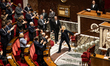 The Rassemblement National MPs, RN, applaud the speech of Marine Le Pen during the debates...