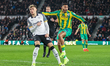 Karlan Grant of West Bromwich Albion watches the mis-hit ball during the Sky Bet Champions...