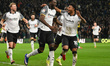 Patrick Agyemang of Derby County celebrates with Rhian Brewster of Derby County after scor...