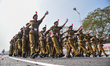 The National Cadet Corps (NCC) marches past ahead of the final dress rehearsal for the upc...