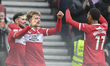 Alan Browne of Middlesbrough celebrates with his teammates after scoring the opening goal...