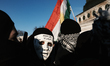 Wears a mask or has ''Kurd mafia'' written on it during a demonstration in solidarity with...