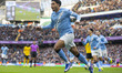 Omar Marmoush #7 of Manchester City F.C. celebrates his goal during the Premier League mat...