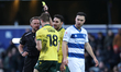 Ben Sheaf of Wrexham (18) receives a yellow card during the Sky Bet Championship match bet...