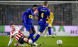 PSV Eindhoven midfielder Paul Wanner, NAC Breda midfielder Kamal Sowah, and NAC Breda defe...