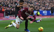 Jarrod Bowen of West Ham United challenges Reinildo Mandava of Sunderland AFC during the P...