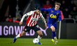 PSV Eindhoven midfielder Ismael Saibari and NAC Breda midfielder Max Balard play during th...