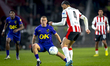 NAC Breda defender Lewis Holtby and PSV Eindhoven defender Armando Obispo play during the...