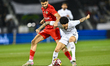 Claudio Luiz Rodrigues of Al Sadd FC and Sultan Adil Alameeri of Shabab Al Ahli Dubai FC a...