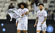Akram Hassan Afif (L) of Al Sadd SC celebrates after winning the Qatar-UAE Super Shield fi...