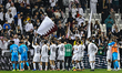 Players of Al Sadd SC celebrate with fans after winning the Qatar-UAE Super Shield final b...