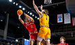 RYAN WILLIAMS (2) of the Northeastern Huskies goes up for a layup during an NCAA men's bas...