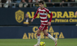 Manu Lama of Granada CF controls the ball during the La Liga Hypermotion match between Cad...