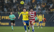 Iker Recio of Cadiz CF competes for the ball with Gonzalo Petit of Granada CF during the L...