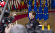Prime Minister of Denmark Mette Frederiksen talks to the media ahead of the emergency Spec...