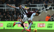 Sven Botman of Newcastle United challenges Morgan Rogers of Aston Villa during the Premier...