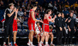 The Northeastern Huskies bench reacts during an NCAA men's basketball game at Daskalakis A...