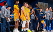 The Drexel Dragons bench reacts during an NCAA men's basketball game at Daskalakis Athleti...