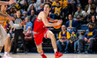 JB Frankel (11) of the Northeastern Huskies drives the ball during an NCAA men's basketbal...