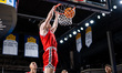 MIKE LOUGHNANE (4) of the Northeastern Huskies throws down a slam dunk during an NCAA men'...
