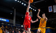 William Kermoury (8) of the Northeastern Huskies goes up for a layup during an NCAA men's...