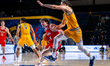 MIKE LOUGHNANE (4) of the Northeastern Huskies drives the ball during an NCAA men's basket...