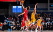 Xavier Abreu of the Northeastern Huskies goes up for a layup during an NCAA men's basketba...