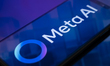 The Meta AI logo appears on the screen of a smartphone placed on a surface reflecting an a...