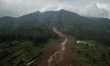 An aerial view shows part of Pasirlangu village after a landslide in Bandung Regency, West...