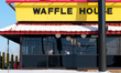 A couple sits at a table inside a Waffle House in Oklahoma City, Oklahoma, on January 26,...