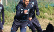 Scott McTonimay of Napoli and Leonardo Spinazzola of Napoli participate in a training sess...