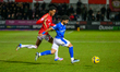 Kallum Cesay of Salford City FC tackles Dilan Markanday of Chesterfield FC during the Sky...