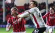 Aden Flint of Walsall FC and Theo Vassell of Crawley Town jostle for position during the S...