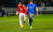 Ryan Graydon of Salford City FC is under pressure from Tom Pearce of Chesterfield FC durin...