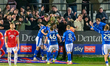 Chesterfield Players celebrate the own goal scored by Brandon Cooper of Salford City FC du...