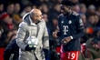 PSV Eindhoven trainer Peter Bosz and SC Bayern Munchen midfielder Alphonso Davies are pres...