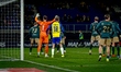 Top Oss goalkeeper Mike Havekotte and RKC midfielder Rein Van Hedel play during the match...