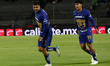 Alan Medina #22 and Jesus Rivas #19 of Pumas celebrate a goal during the match correspondi...