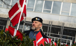Denmark's veterans carry flags with the names of Danish soldiers who fall in Afghanistan a...