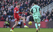 Tommy Conway of Middlesbrough is fouled by Vladan Kovacevic, the Norwich City goalkeeper,...